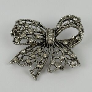 Vintage Silver Tone Rhinestone Bow Brooch Openwork Ribbon Statement Pin